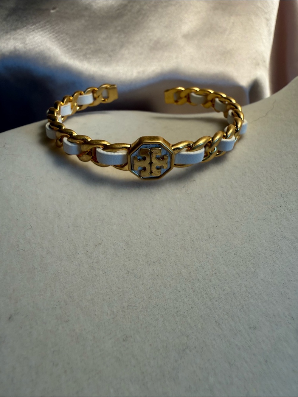 Gold and White Chain-Link Cuff Bracelet with Center Emblem
